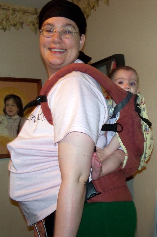 pumping and babywearing; getting ready to start up the knitting machine